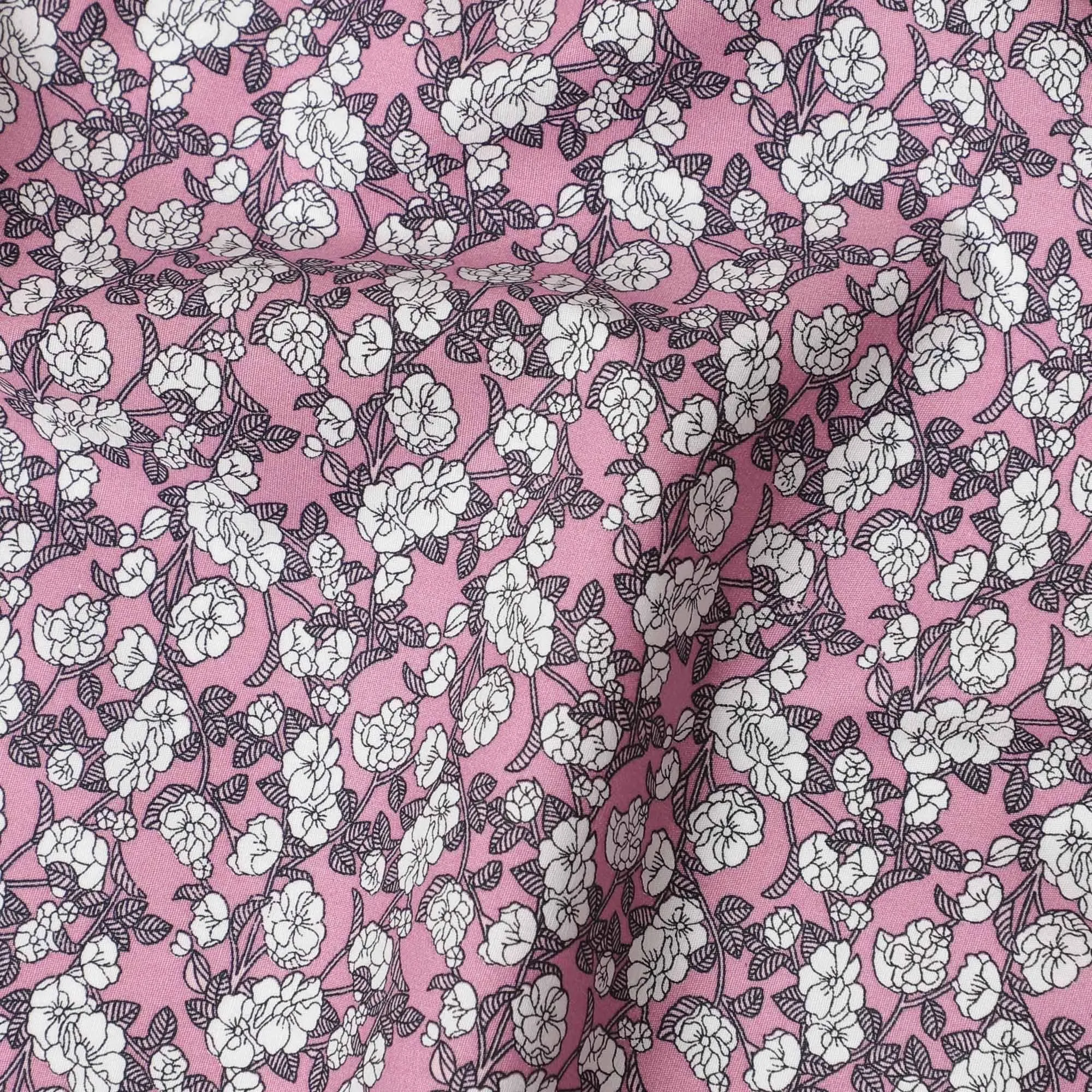 Baby pink cotton fabric with white and black print in floral design-D14843