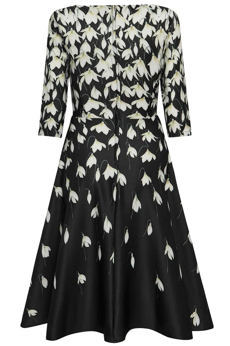 Beatrix Long Sleeved Black Midi Dress in Falling Snowdrop Print