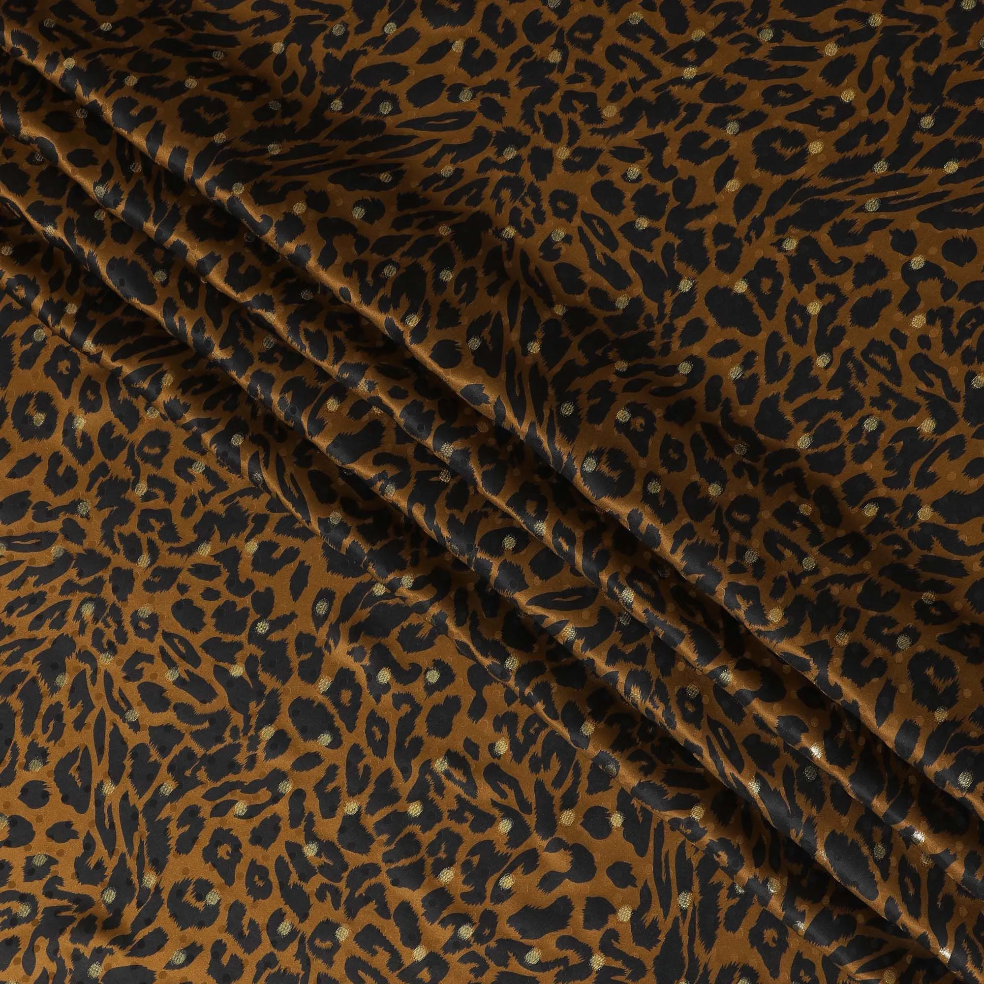 Mustard Premium pure silk satin fabric with black print having gold metallic lurex in animal skin design-D17073