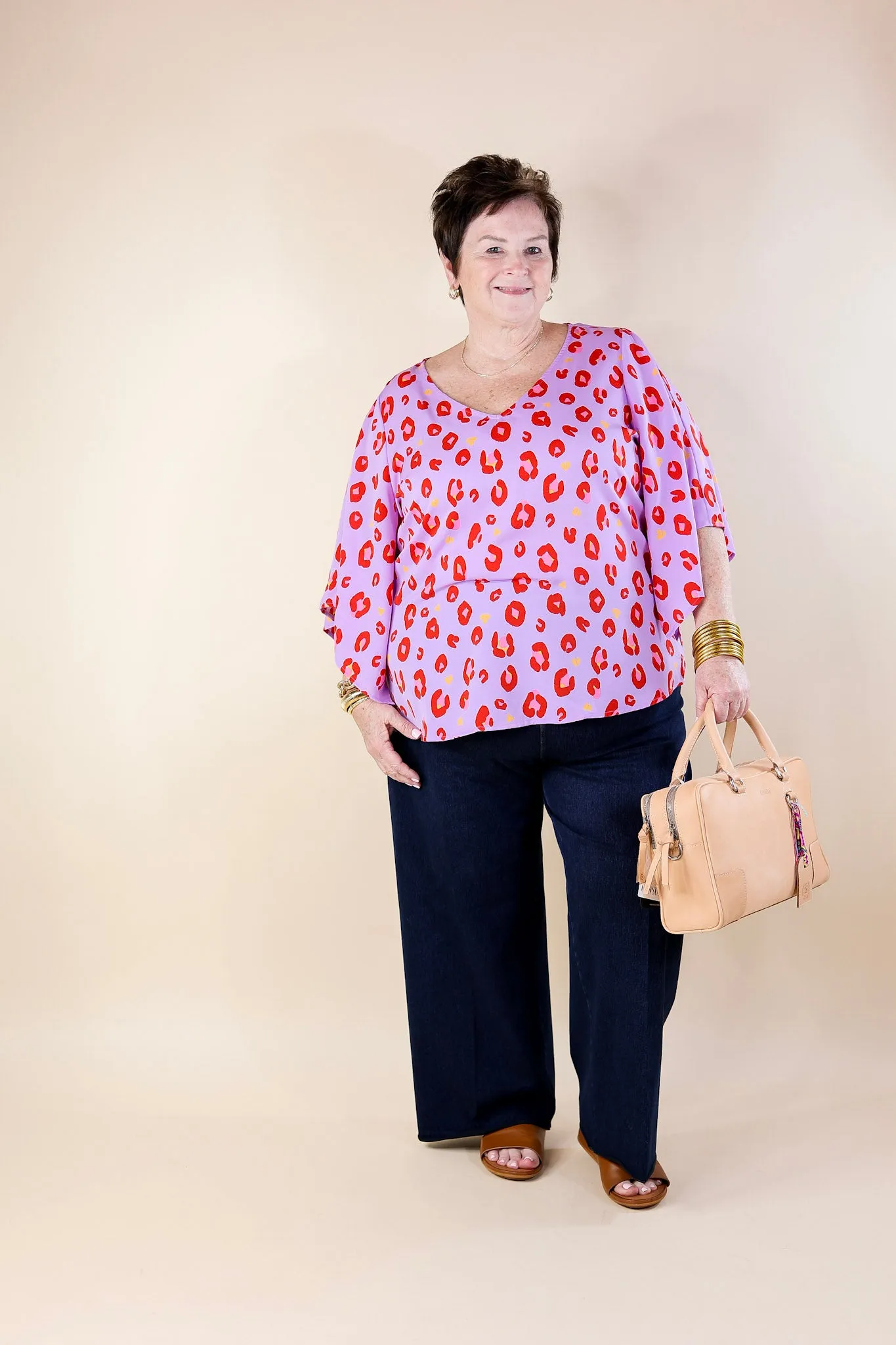 Radiant Glow V Neck Leopard Print Top with Flowy Sleeves in Purple